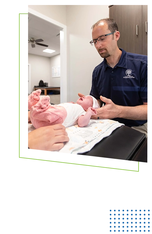 Chiropractor Brian Tolman Calmly Adjusting Pediatric Patient